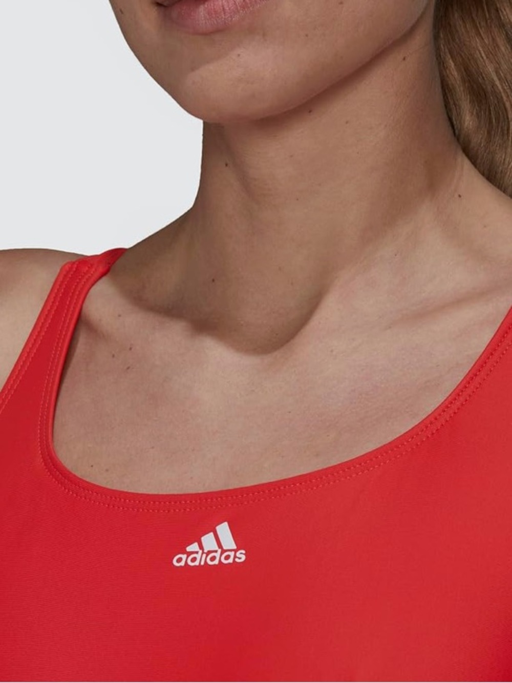 Adidas bright red Adidas athletic tank top featuring a silver logo SZ:L